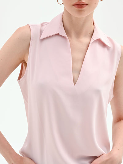 Blusa rosa pastello con collo a rever
