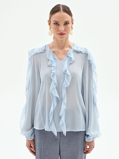 Blusa azzurro cielo con rouches