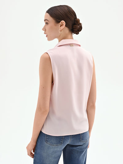 Blusa rosa pastello con collo a rever
