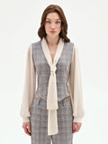 Blusa azzurra check con gilet e collo lavallière