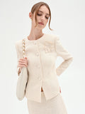 Giacca bouclé beige chiaro con fiore applicato