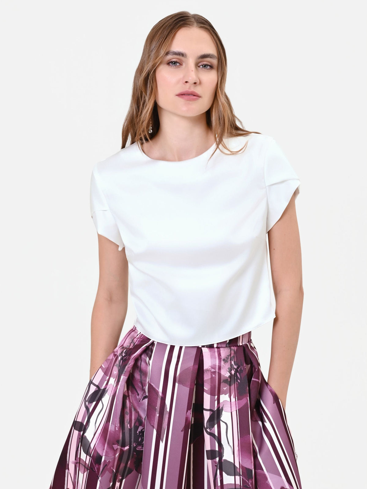 Blusa panna con maniche a risvolto