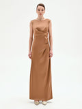 Abito lungo marrone bronzo con drappeggio asimmetrico