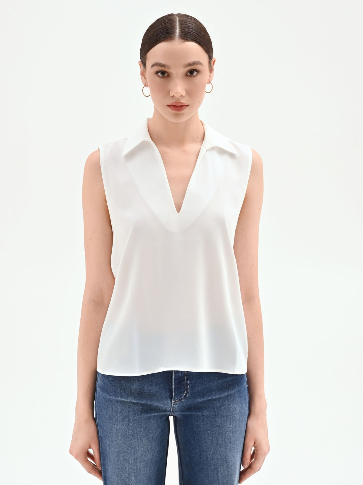 Blusa smanicata bianco panna