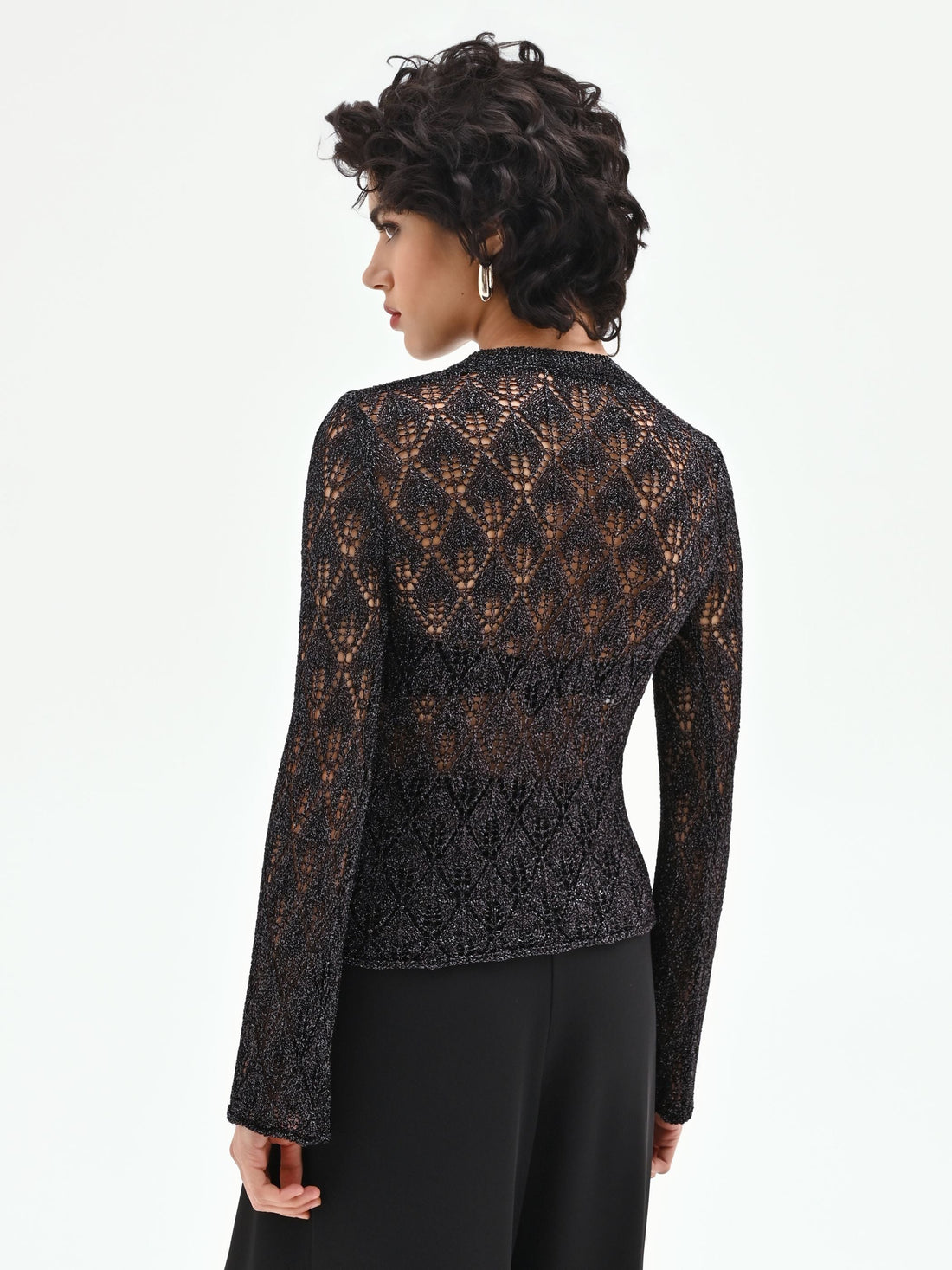 Maglia nera con lavorazione traforata e lurex