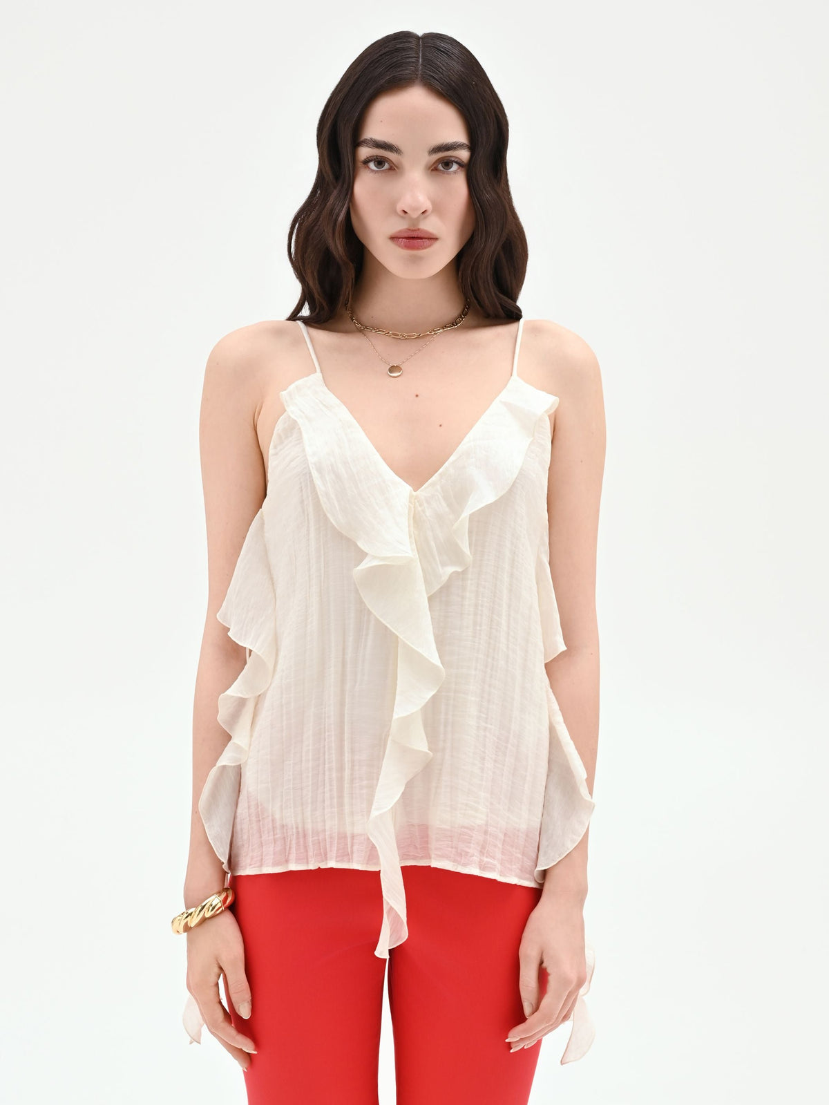 Top bianco con rouches asimmetriche