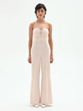 Tuta palazzo beige chiaro con bottoni e bustier