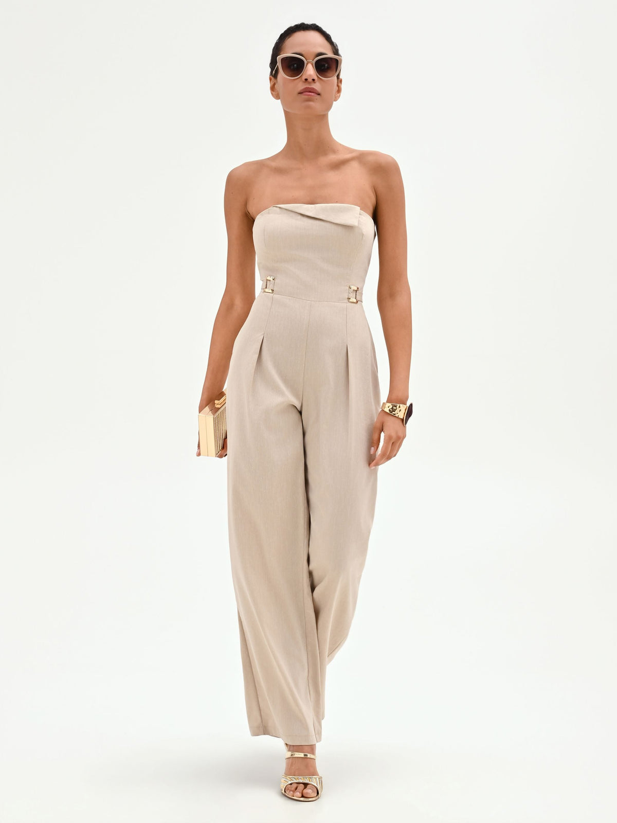 Tuta a fascia beige chiaro con gamba larga