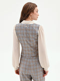 Blusa azzurra check con gilet e collo lavallière