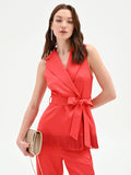 Gilet in raso rosso fragola con frange
