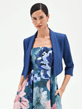 Giacca corta blu brillante con collo sciallato