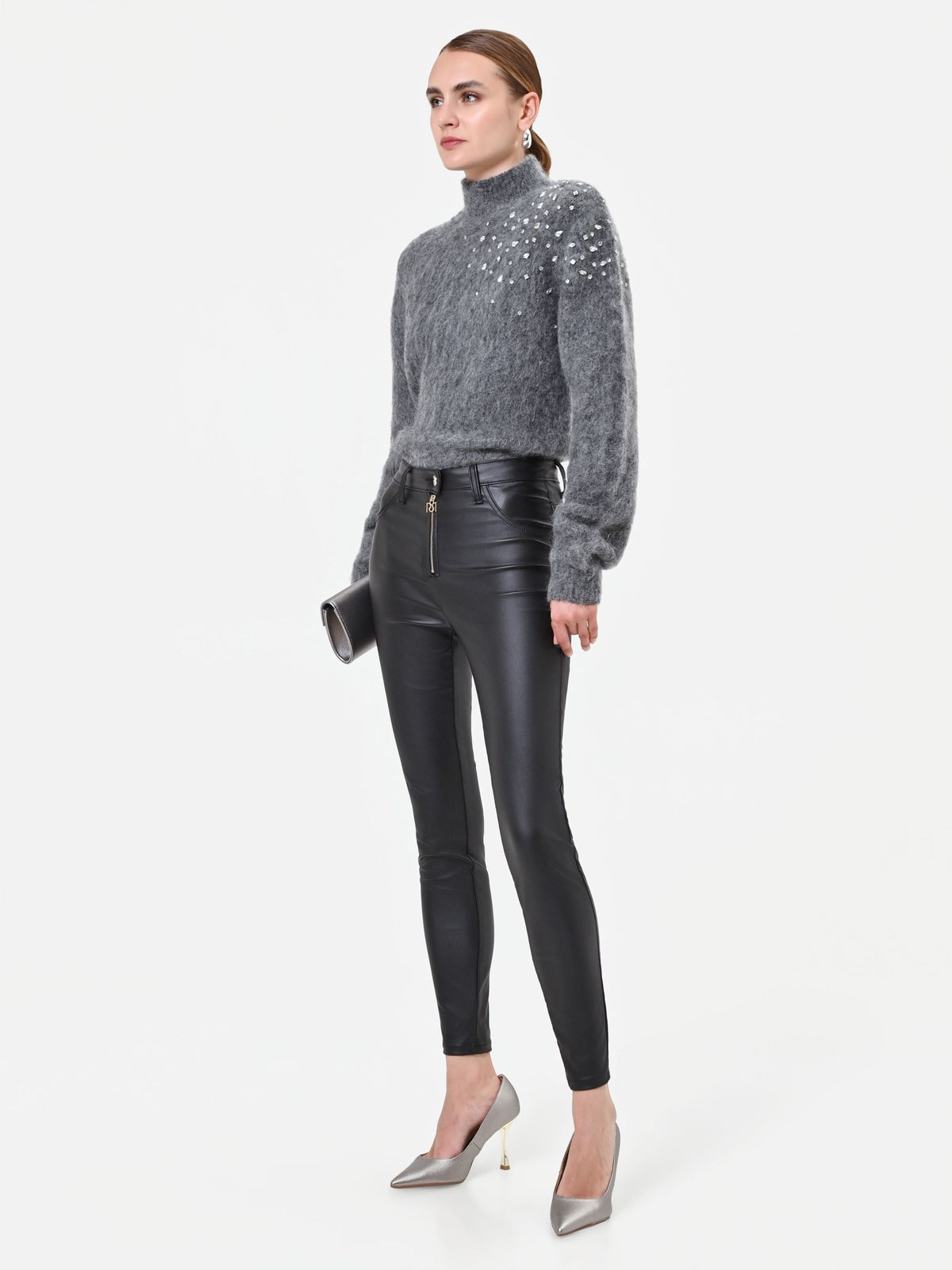 Leggings neri in similpelle con zip frontale