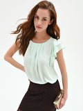 Top verde menta con maniche a volant
