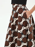 Gonna lunga cioccolato con stampa geometrica