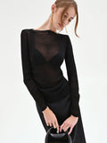 Blusa nera con drappeggio laterale