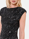 Top nero in paillettes