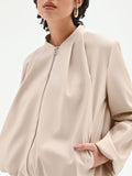 Bomber in similpelle tortora beige con maniche a palloncino
