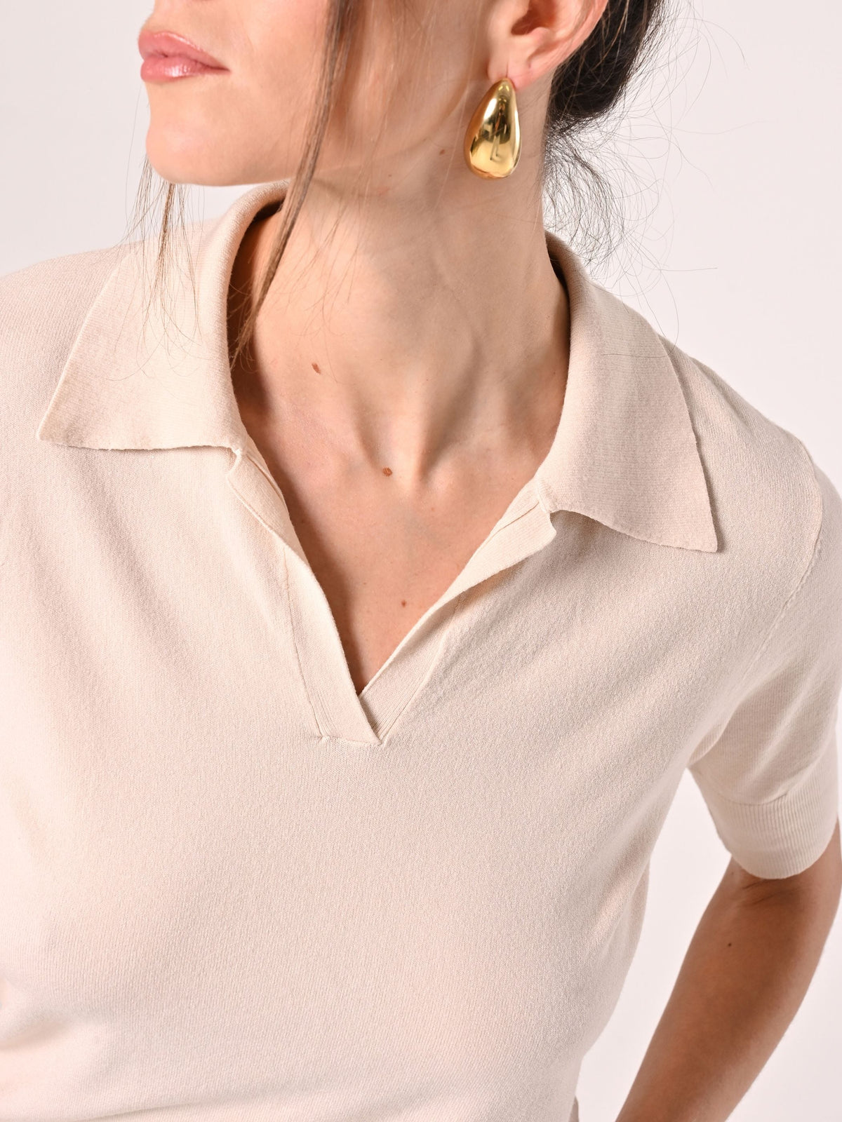 Polo in maglia beige chiaro