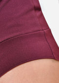 Top smanicato bordeaux con pizzo e drappeggio
