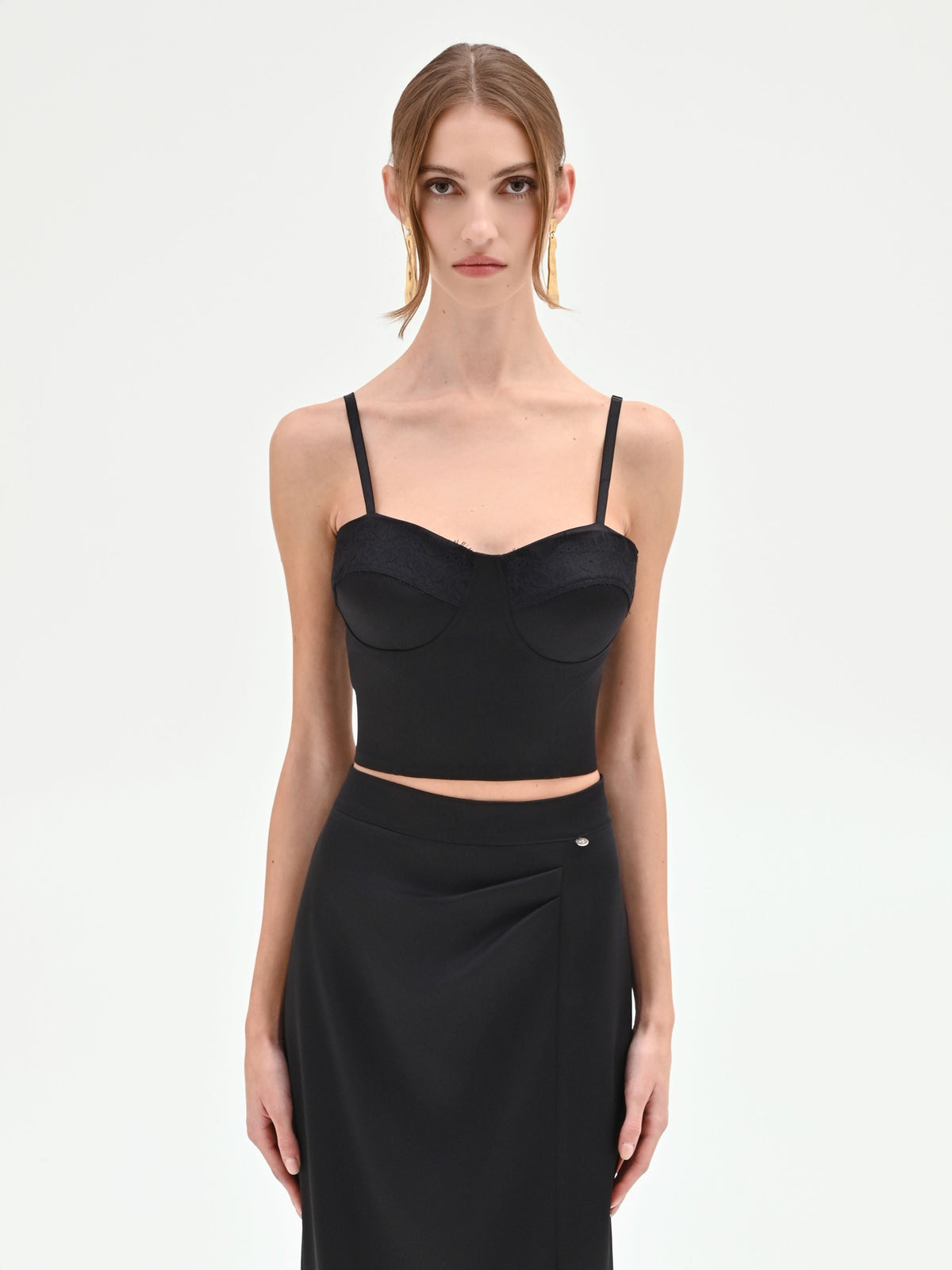 Top bustier nero con profili in pizzo