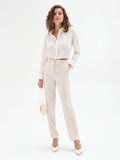 Pantaloni slim bianchi in tessuto fluido mano Crepe