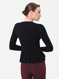 Maglia nera a costine con fondo a peplo in misto viscosa