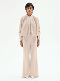Bomber in similpelle tortora beige con maniche a palloncino