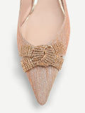 Décolleté slingback oro con fiocco
