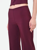Pantalone a palazzo bordeaux rosso con piega stirata in tessuto tecnico