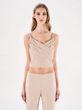 Top beige chiaro con incrocio drappeggiato