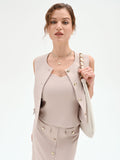 Top Studio beige a cuore con impunture