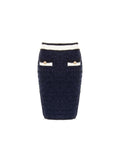 Gonna tubino in maglia blu navy con profili a contrasto