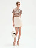 Minigonna beige chiaro a vita alta