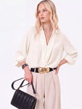 Blusa bianca con incrocio in raso