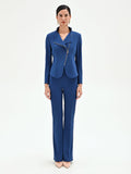 Giacca blu brillante con zip asimmetrica