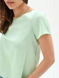 Blusa verde menta in tessuto fluido