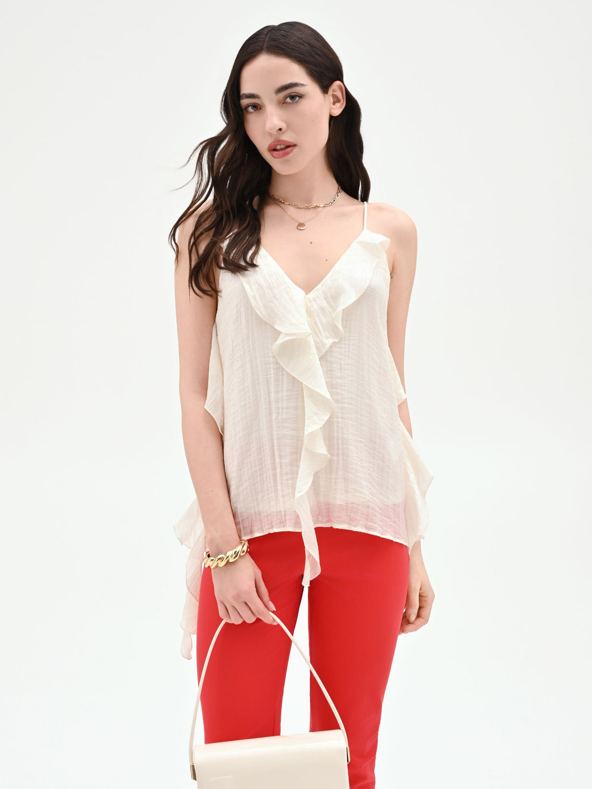 Top bianco con rouches asimmetriche
