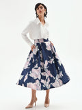 Gonna midi svasata in duchesse a fiori blu brillante