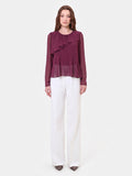 Blusa bordeaux con volant asimmetrico