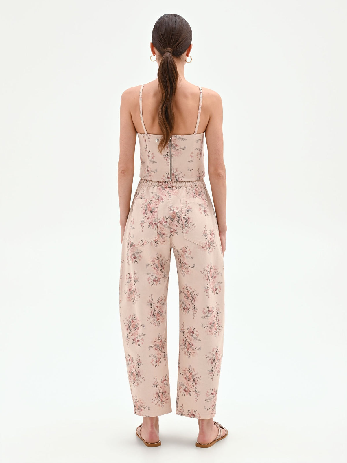Pantalone rosa in denim stampa floreale