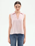 Blusa rosa pastello con collo a rever