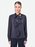 Blusa blu navy con collo a fiocco e volant