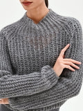 Maglia a collo alto grigia con filato lurex