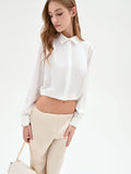 Camicia cropped panna con fondo elastico