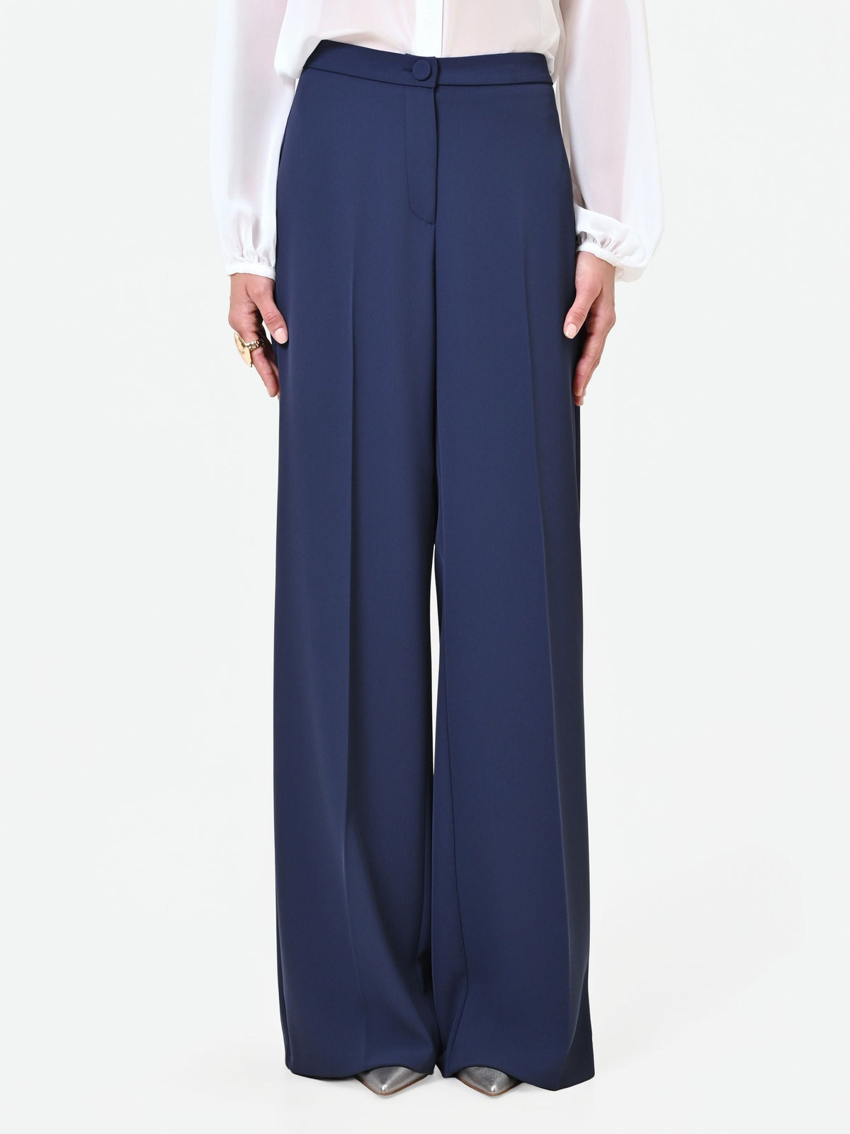 Pantalone a palazzo blu navy dalla linea fluida