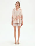 Blusa bianca con stampa floreale a rose