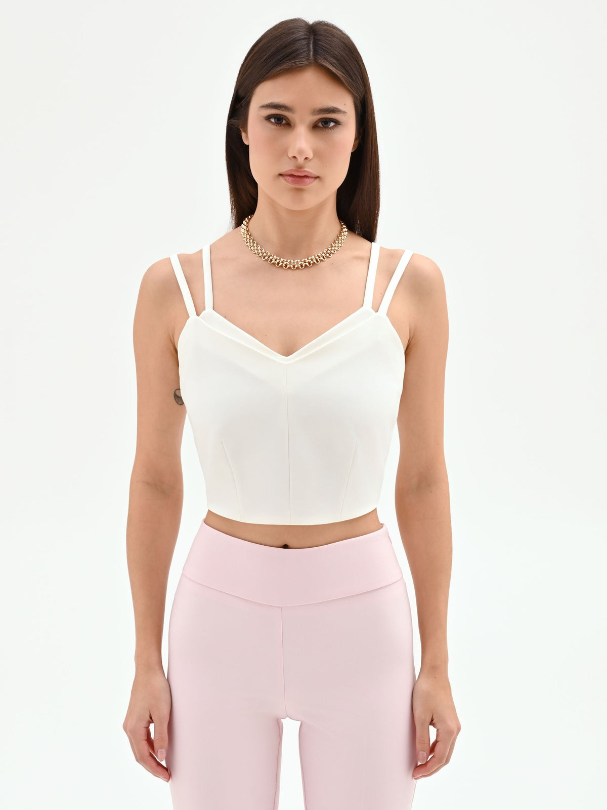 Top crop bianco con doppie spalline