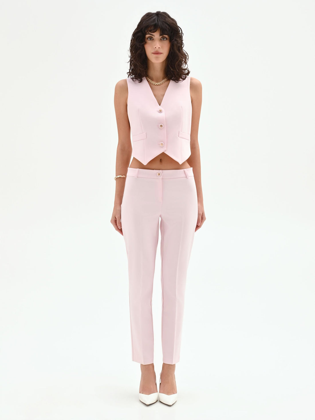 Gilet rosa pastello dal taglio cropped