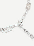 Cintura catena argento con monogramma traforato
