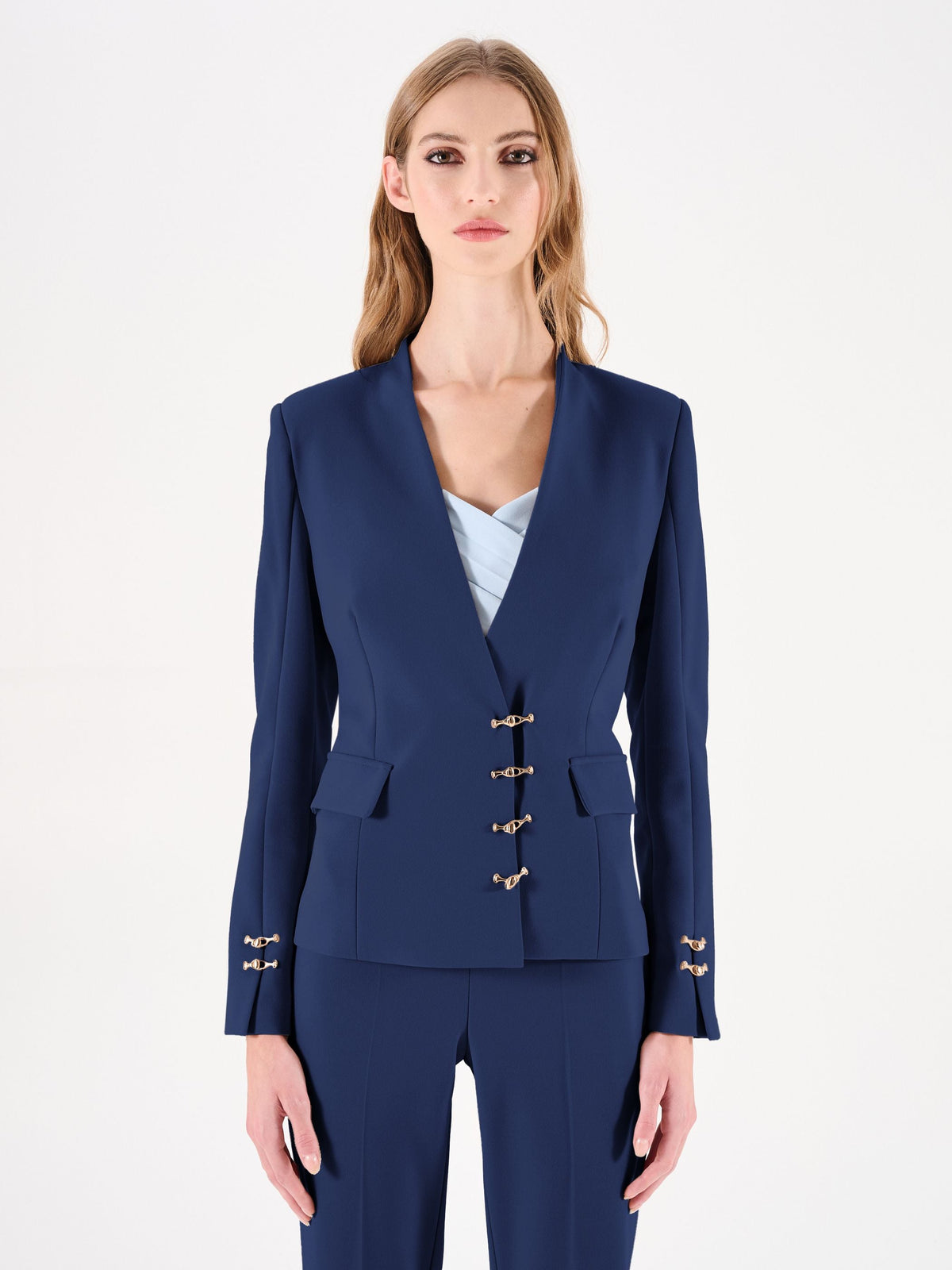 Giacca blu con alamari dorati